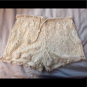 Off-white lace shorts